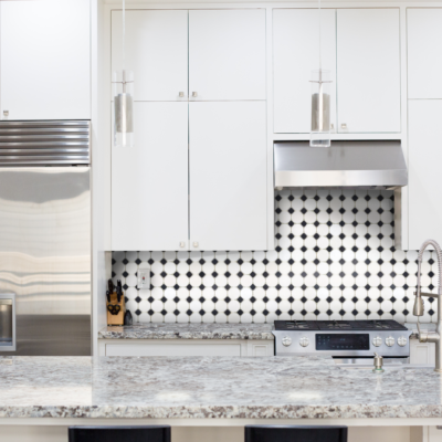 Kitchen with Fridge and Granite Counter Buttons