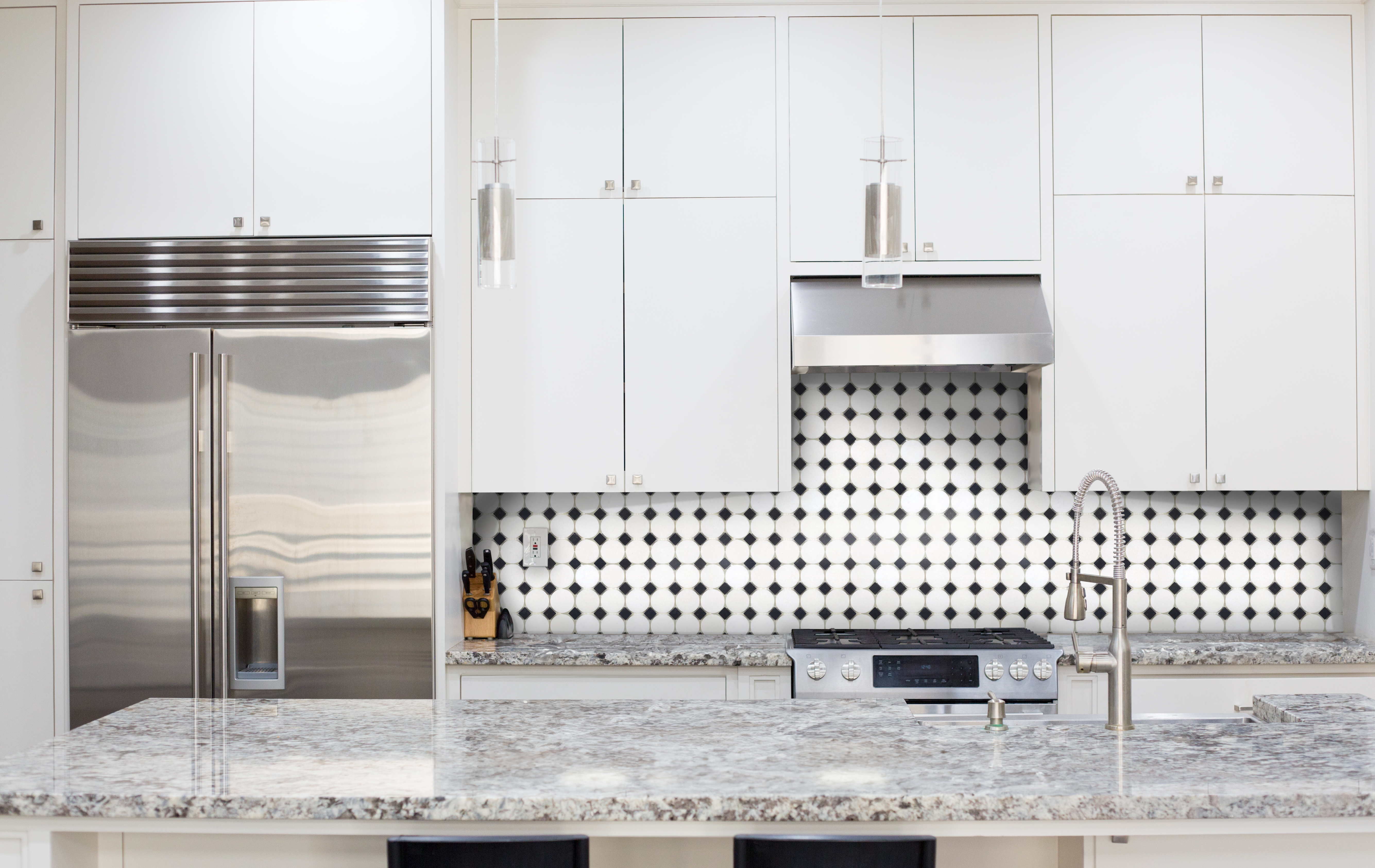 Kitchen with Fridge and Granite Counter Buttons